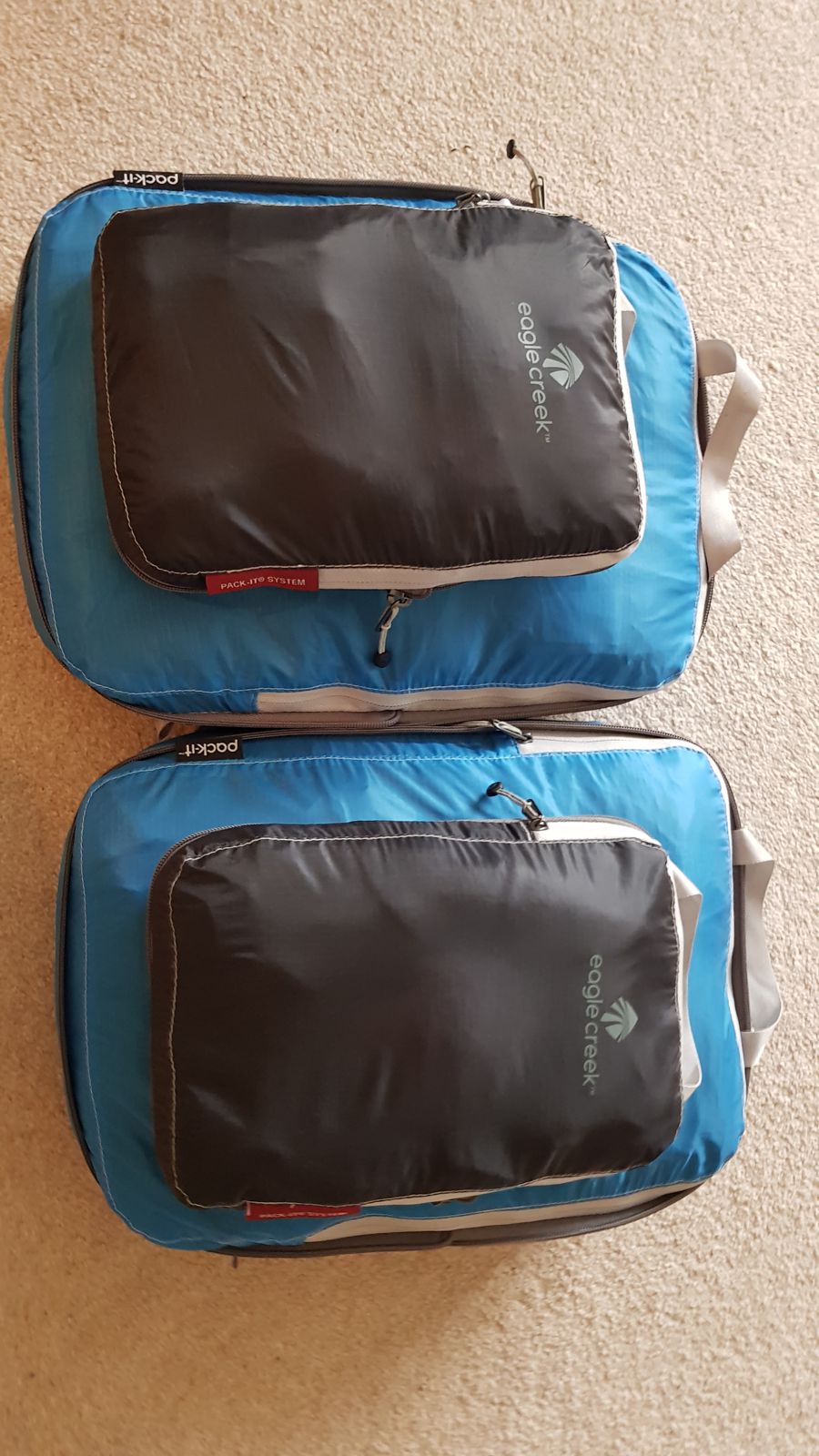 Smaller packing cubes packed inside larger ones
