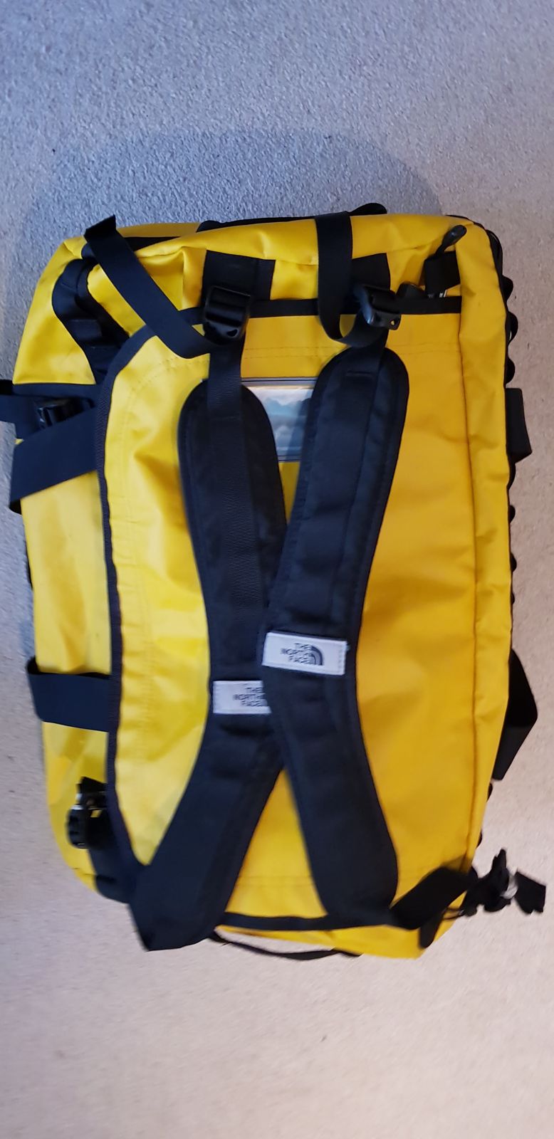The North Face Base Camp Duffel with its backpack straps