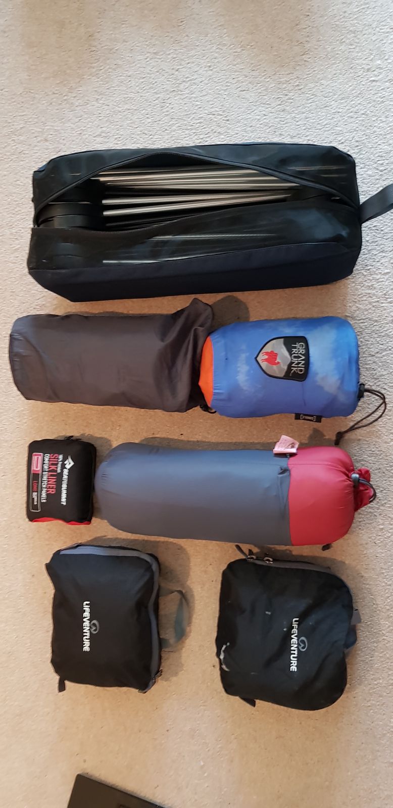 Camp bed, hammock, sleeping bag, silk liner and packable bags