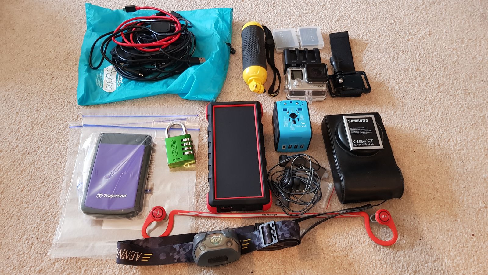 My tech: power bank, adapter, GoPro, hard drive, padlock, head torch and cables