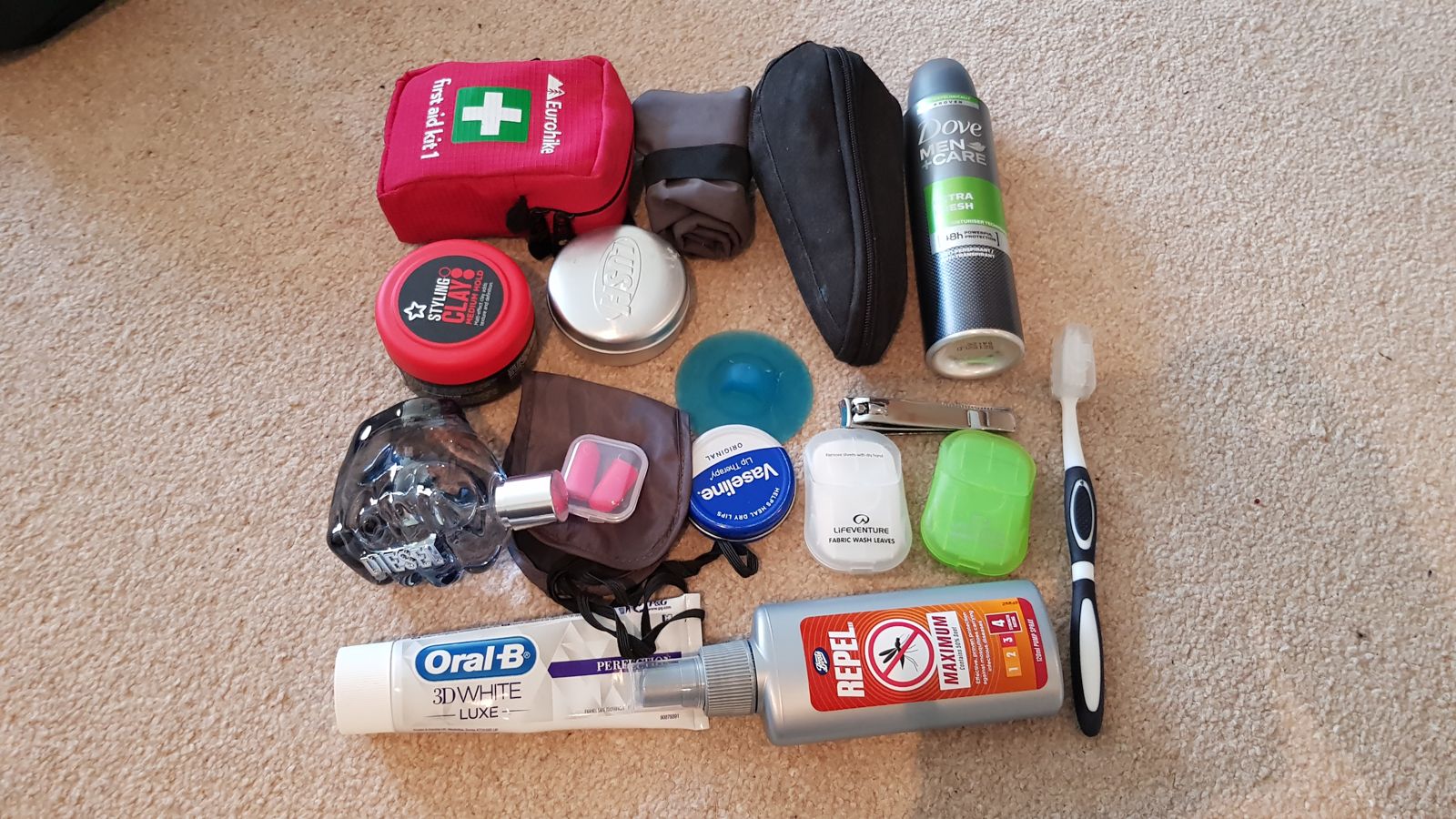 Toiletries, first aid kit, insect repellent, soap leaves and earplugs