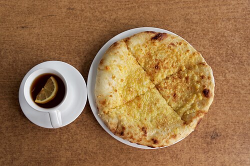 Eat Adjarian khachapuri
