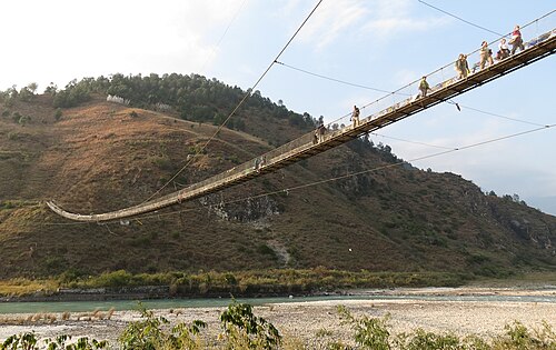 Cross the suspension bridge