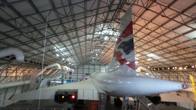 Concorde's slender nose and fuselage inside the Barbados hangar.