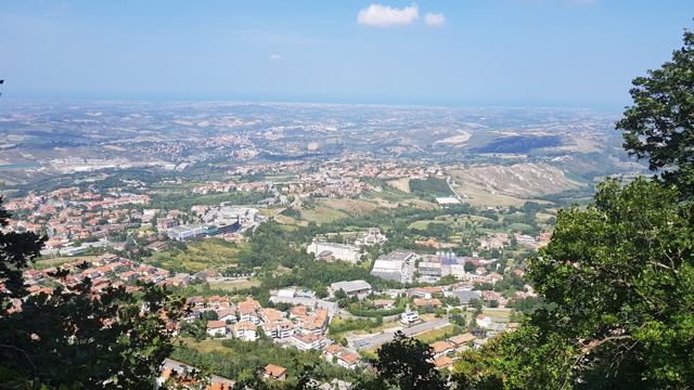 The view from San Marino's hilltop over green Italian countryside