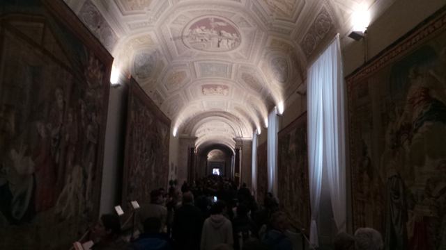 A long gilded corridor in the Vatican Museums.